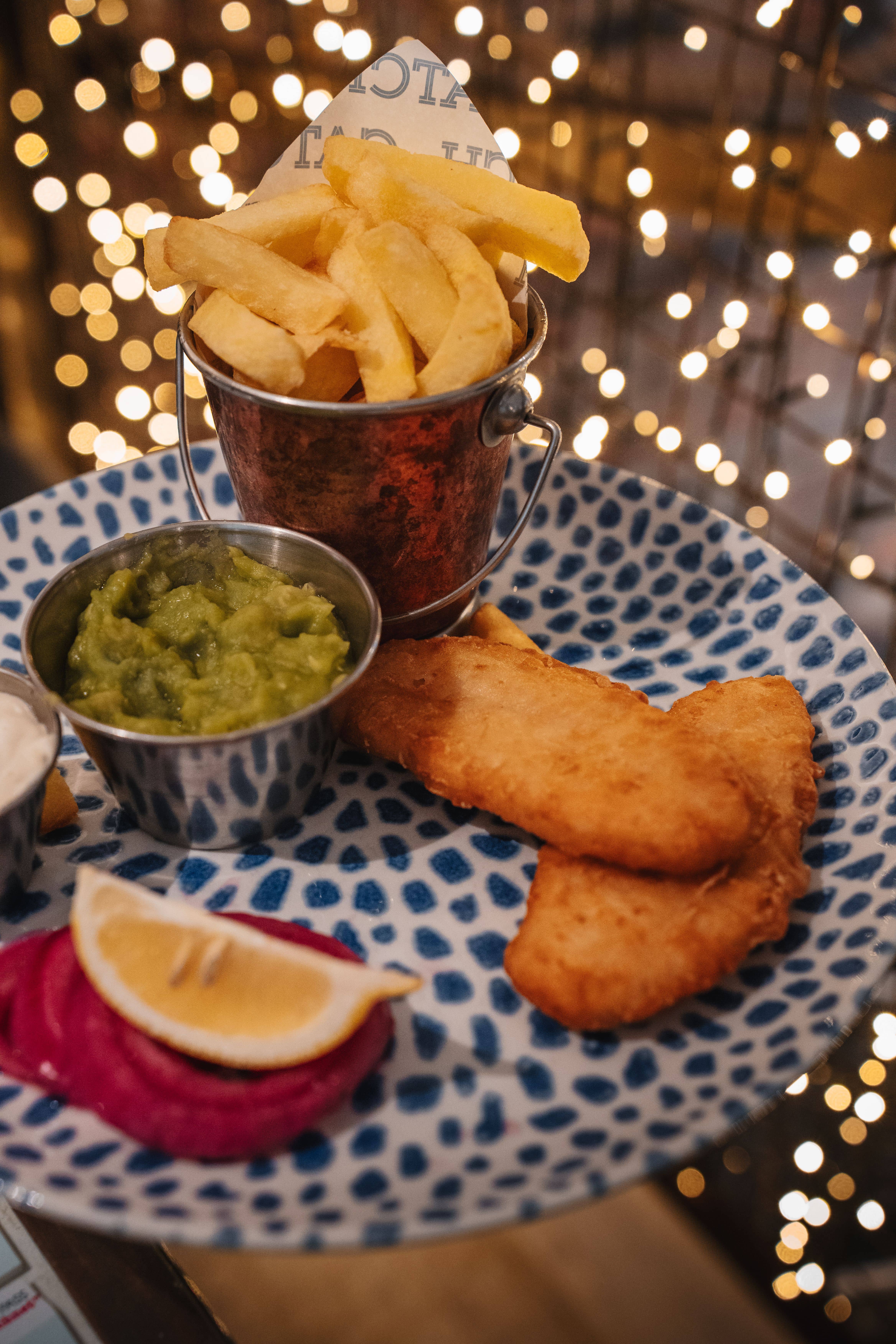 A half sized portion of fish and chips